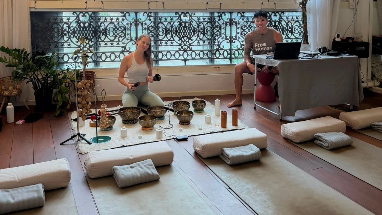 Luke and Candice with singing bowls and mats prepared for The Art of Stillness