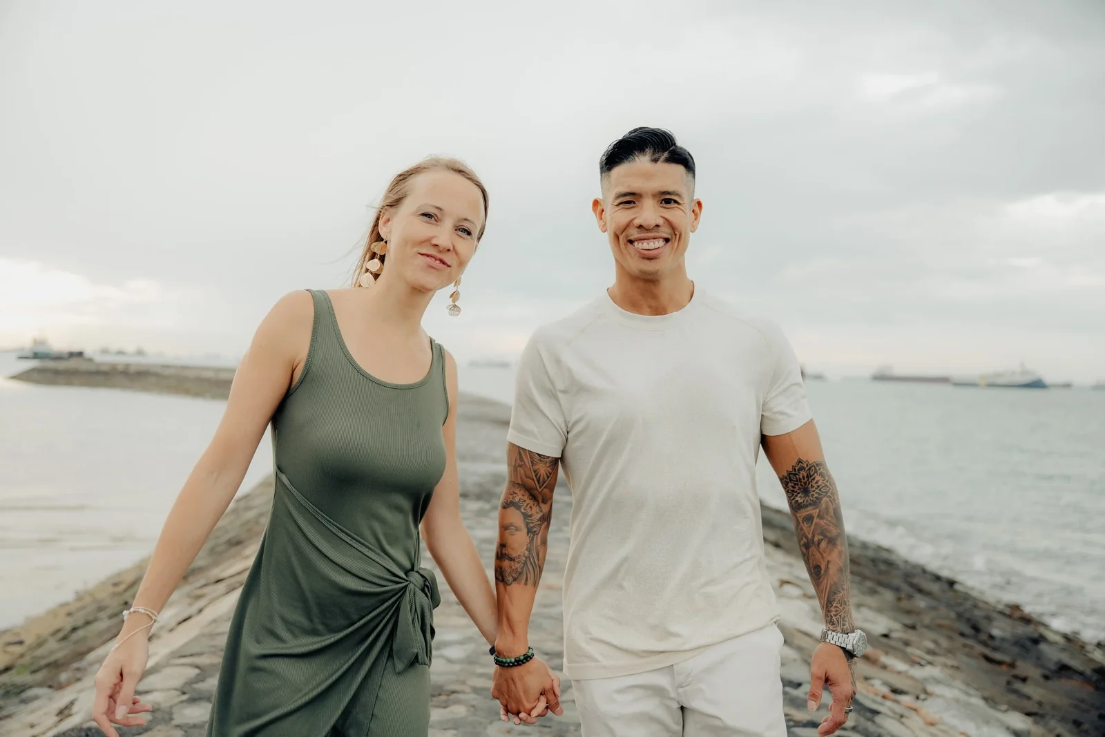 Candice Chaignat and Luke Tan standing together by the water